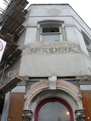 Evidence of the McKenna ownership above the corner doorway, revealed during renovations in 2009